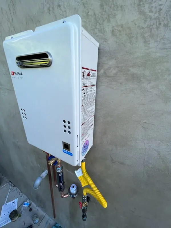 Tankless water heater installation for Hiland homes